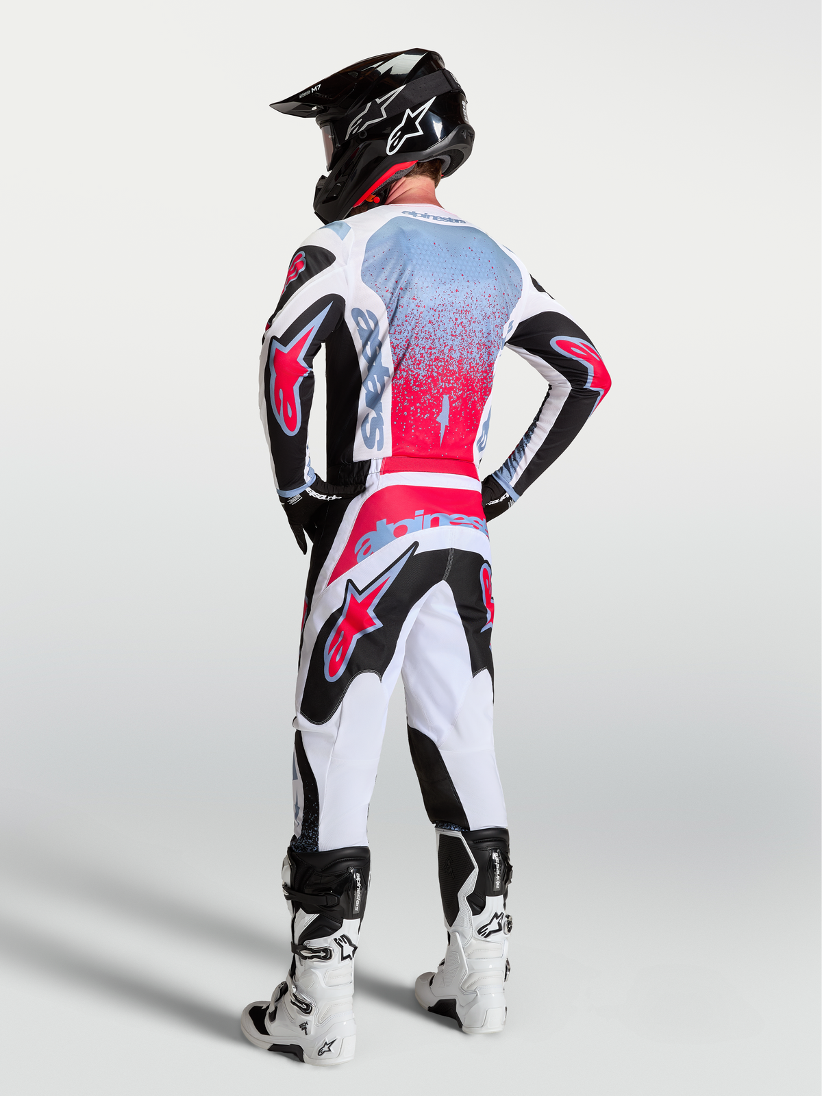 Alpinestars Fluid Drag Jersey, Men's Motocross Gear, Black and Red Fluo, breathable moisture-wicking textile, rear view on model.