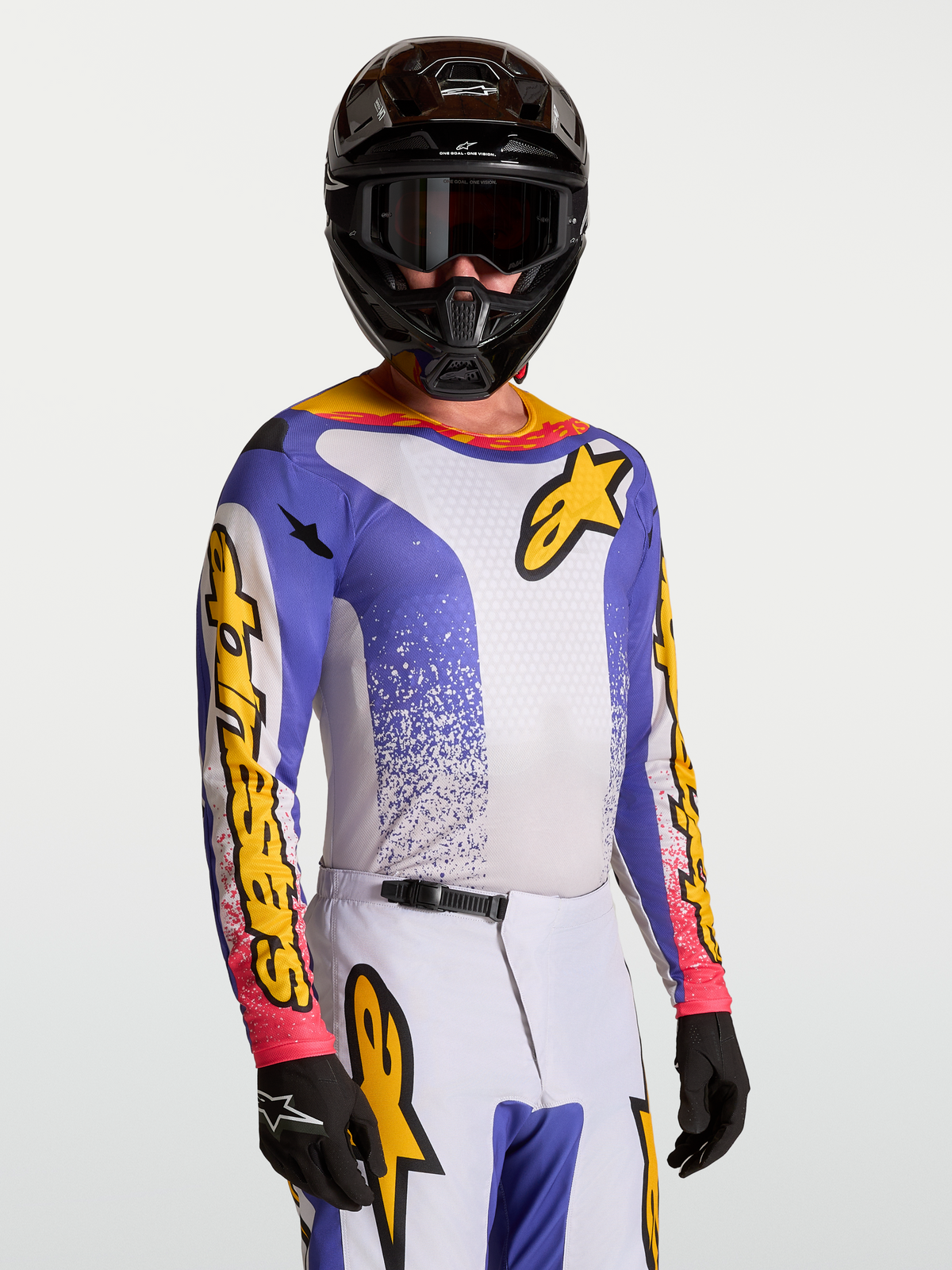 Alpinestars Fluid Drag, maillot de motocross bleu et jaune pour homme, tissu respirant pour la performance tout-terrain.
