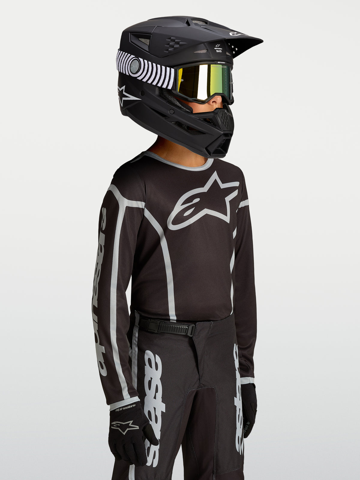 Alpinestars Fluid Apex V2 Jugend-Trikot, Motocross-Trikot, Schwarz und Silber, feuchtigkeitsableitendes Polygewebe mit Logo