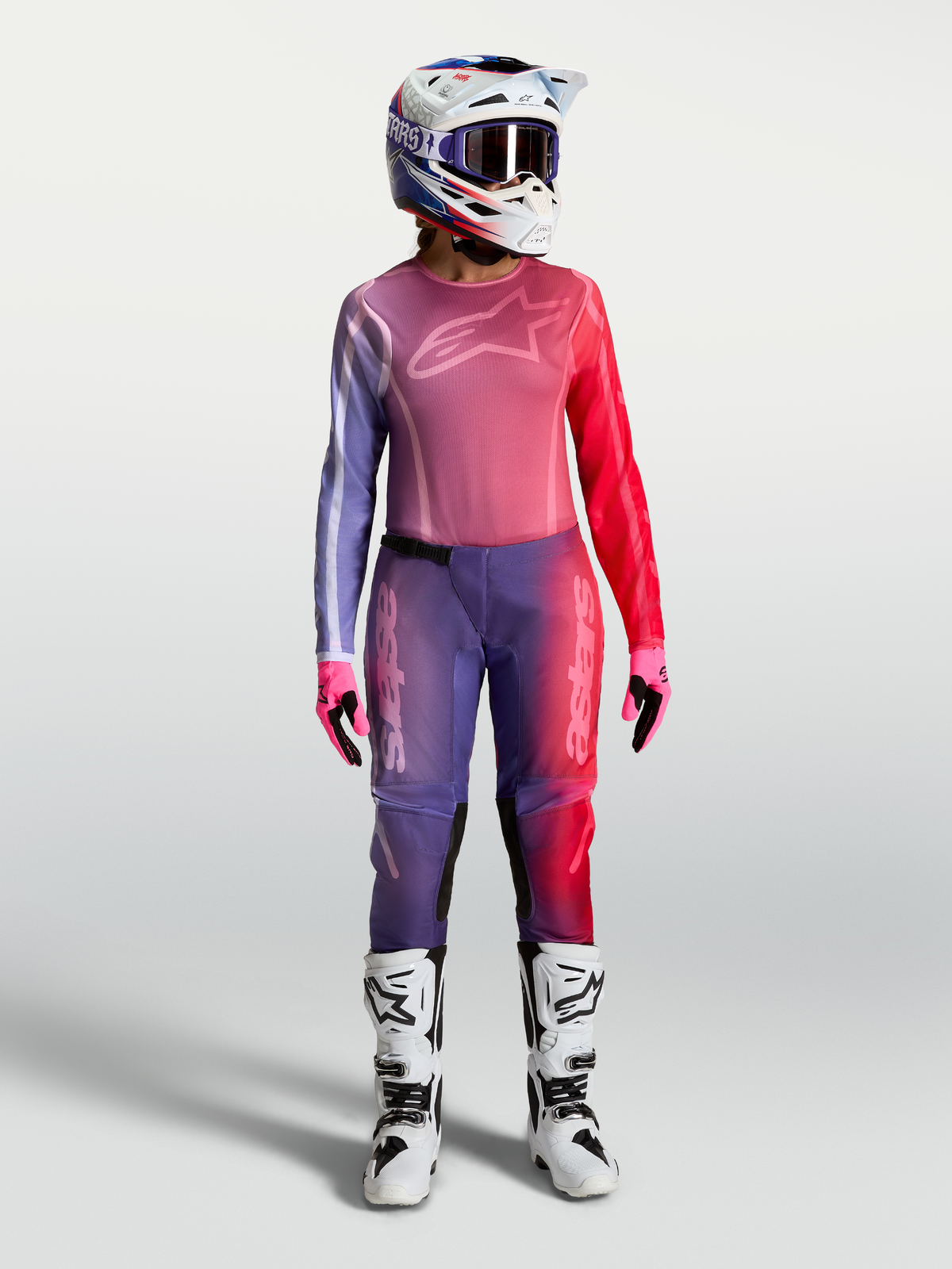 Alpinestars Stella Fluid Kepler Gear Set, ensemble de motocross pour femme, violet et rouge, avec maillot et pantalon de performance.