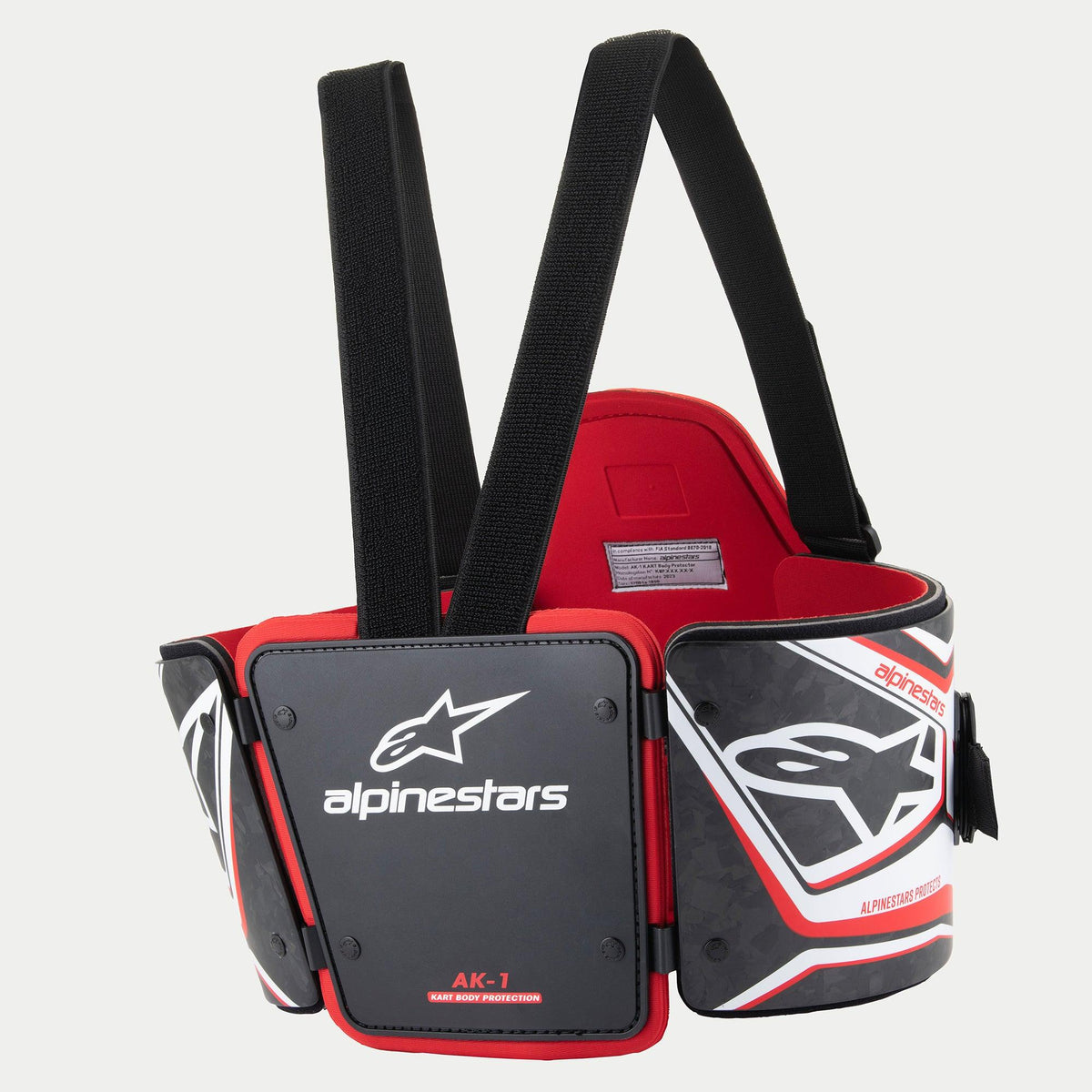 Alpinestars AK-1 Kart Body Protector, protection corporelle de karting, noir, blanc et rouge, dotée de panneaux de côtes en fibre de carbone, d'un rembourrage intérieur rouge, de bretelles noires réglables et de logos Alpinestars bien visibles