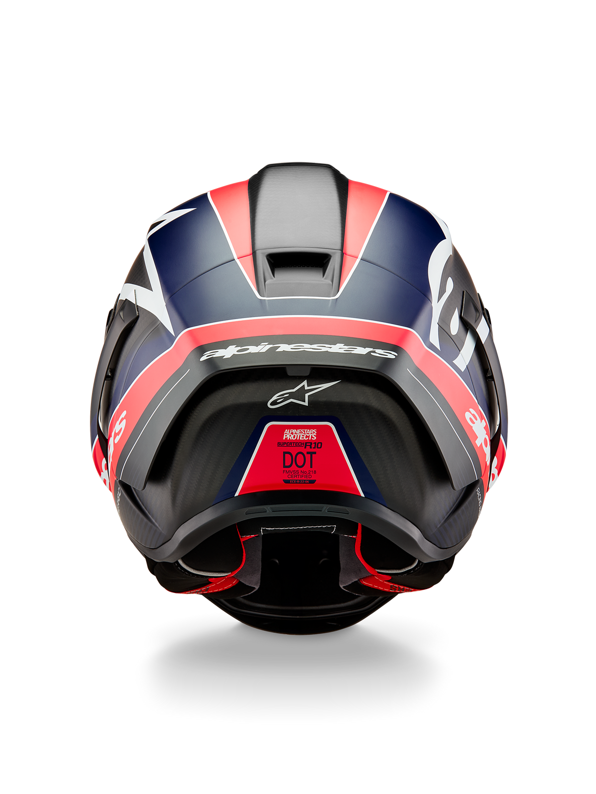 Alpinestars Supertech R10 Team Helm, achteraanzicht, zwart carbon met Red Fluo en Blue Matte accenten, voorzien van een aerodynamische spoiler, opvallende witte Alpinestars-branding en DOT-certificeringslabel, professionele motorsportuitrusting