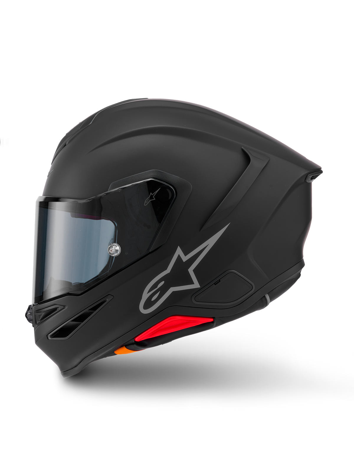 Alpinestars S-R7 Solid Helm, integraalhelm voor motorrijders, matzwart, zijaanzicht, voorzien van een zilverkleurig Astars-logo op de zijkant, aerodynamisch ontwerp met geïntegreerde spoiler en kinventilatie, rode en oranje accenten aan de basis.