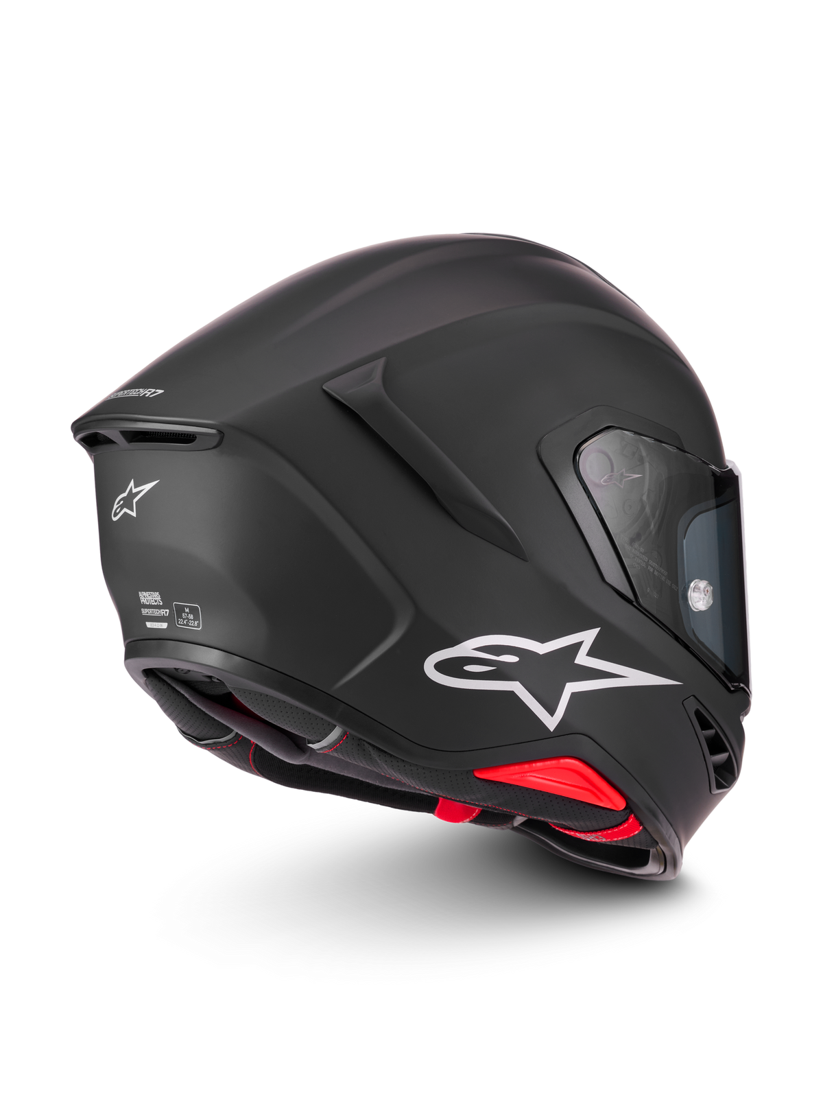 Alpinestars Supertech R7 Solid Helm, matte zwarte motorhelm met wit Astar-logo en rode interieurdetails, CE- en DOT-gecertificeerde circuit- en weghelm, driekwart weergave