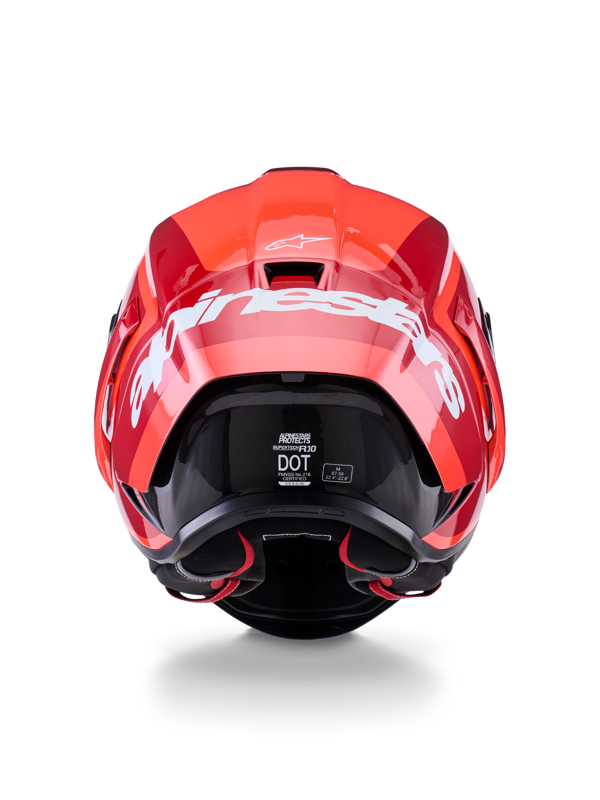 Alpinestars Supertech R10 Arius-helm, achteraanzicht, glanzend rood en donkerrood design, groot wit Alpinestars-woordmerk over de achterkant, DOT- en ECE-certificeringslabels zichtbaar, hoogwaardige aerodynamische racehelm