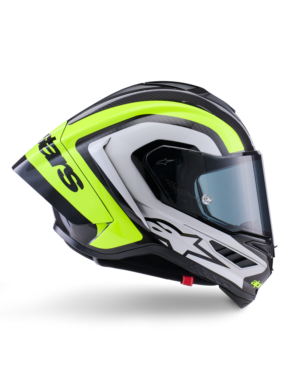 Casque Alpinestars Supertech R10 Arius, casque intégral de course, noir, argent et jaune fluo brillant, vue de profil montrant la coque aérodynamique et l'écran fumé foncé, construction en fibre de carbone avec marquage distinctif