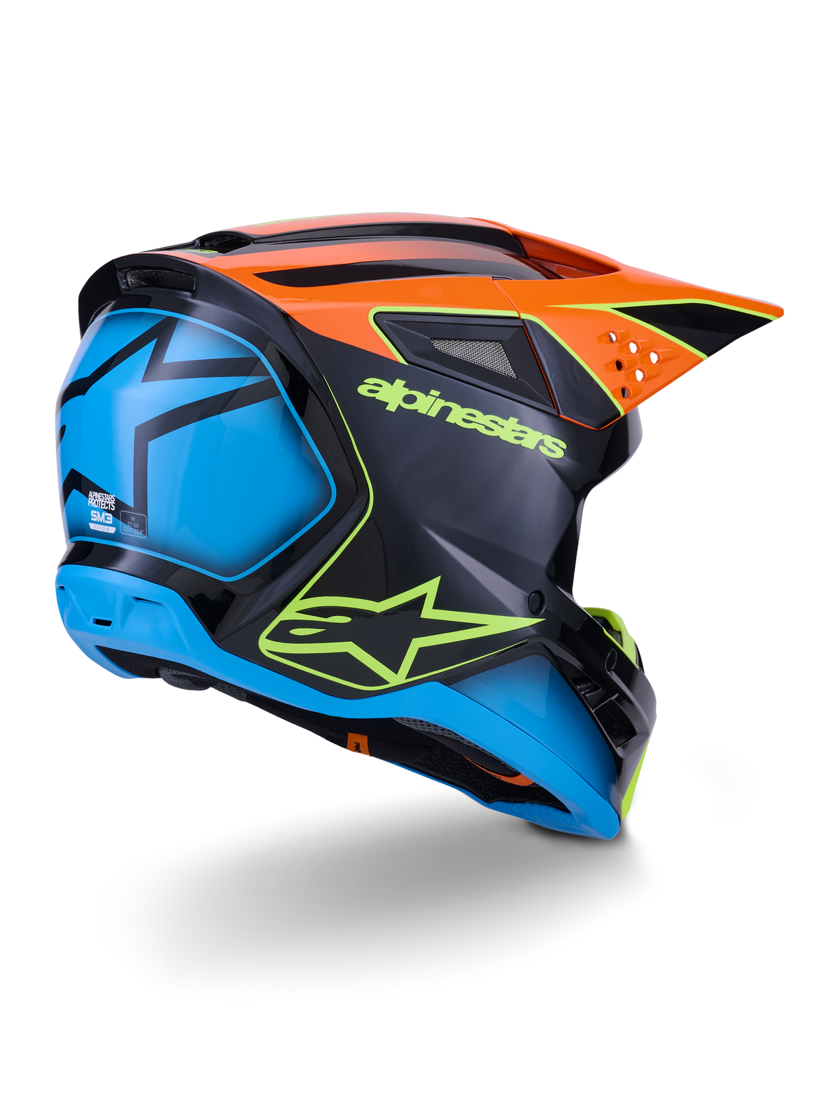 Alpinestars S-M3 Fray Helm ECE 22.06, Motocross-Helm, Schwarz mit orangen und blauen Paneelen, neongelbes Alpinestars-Logo, große blaue Rückseite mit Stern-Grafik, oranges Visier mit integrierten Belüftungsöffnungen, professionelle Offroad-Schutzausrüstung