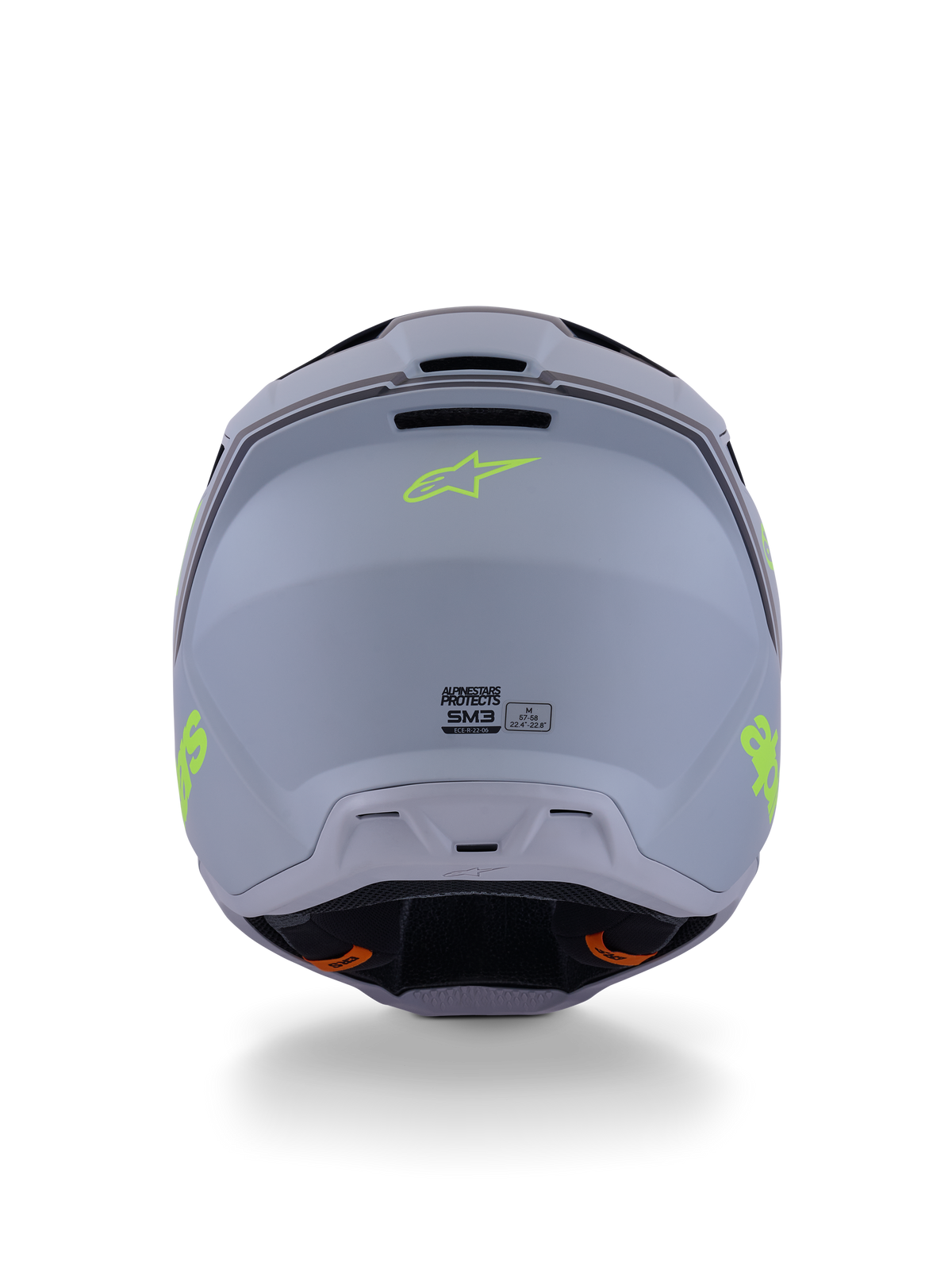 Alpinestars S-M3 Radium Helm, Motocross-Helm, Grün, Schwarz und Gelb Fluo Matt, Rückansicht mit matter Schalenoberfläche, neongelbem Alpinestars-Logo und ECE 22.06-Zertifizierungsdetails.