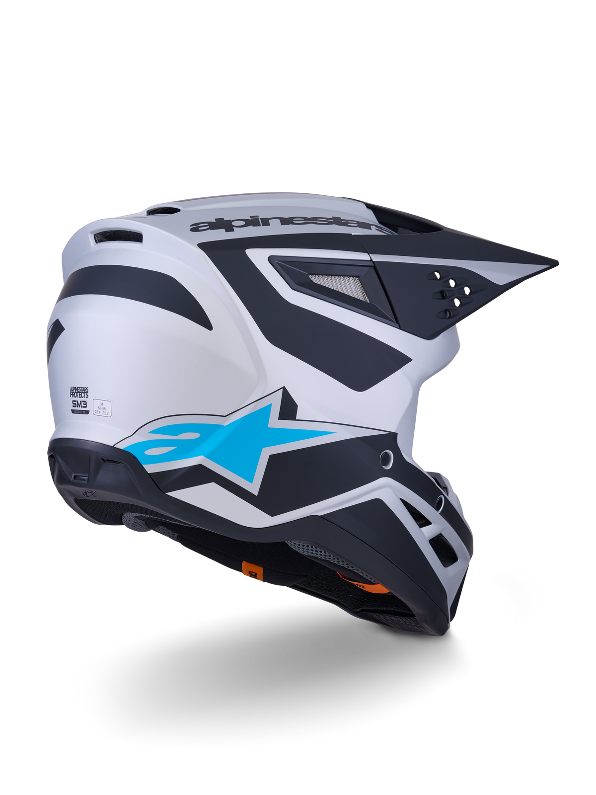 Alpinestars S-M3 Heat Helm ECE 22.06, Motocross-Helm, Silber-Blau und Schwarz Matt, Rückansicht mit großem blauen Stern-Logo und schwarzen kantigen Designs, aerodynamische Schale mit Belüftungsöffnungen, Hochleistungs-Schutz für Offroad-Rennen