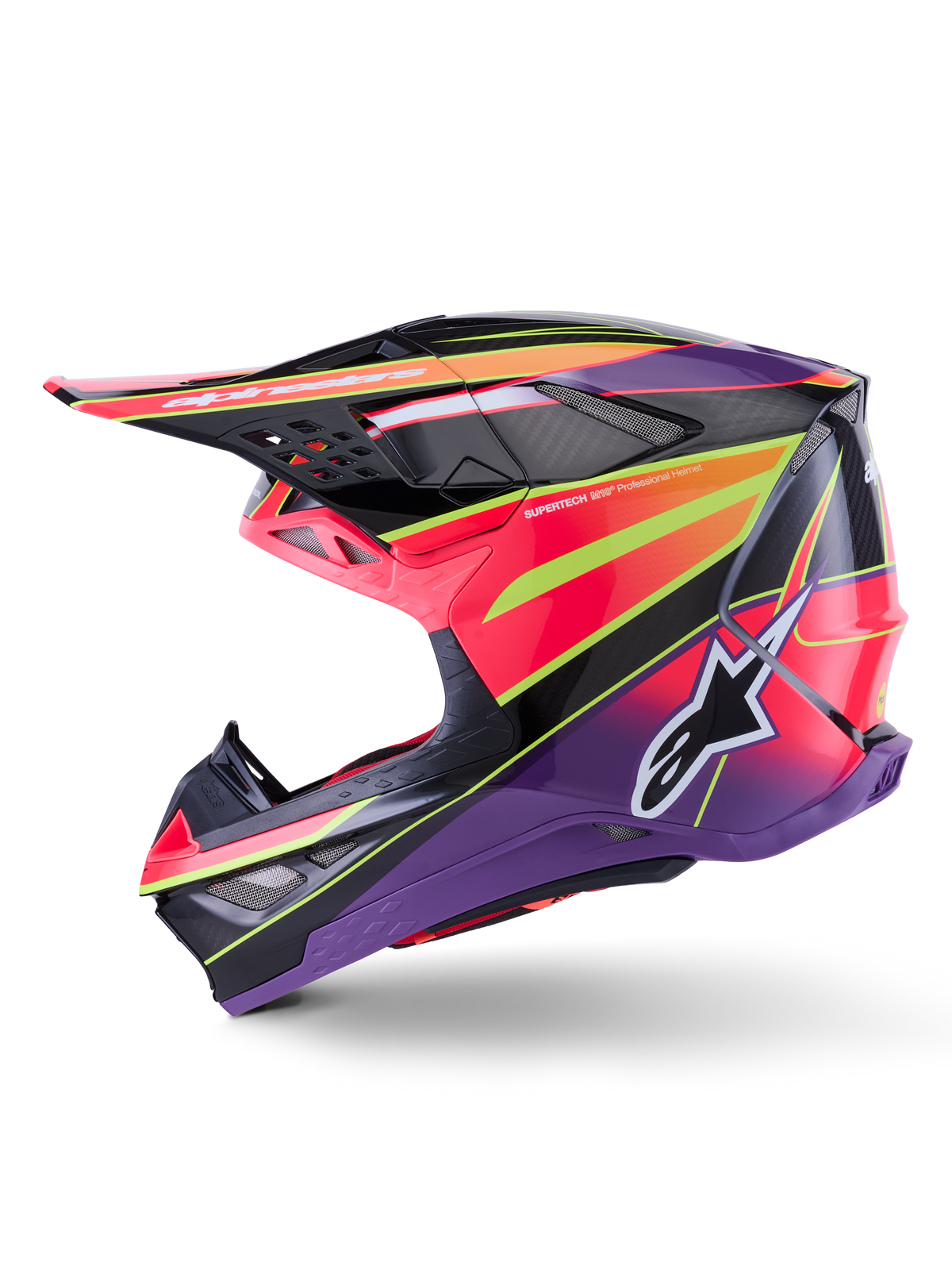 Casque Alpinestars Supertech M10 Era, casque de motocross, rose, violet et jaune fluo brillant, vue de profil avec graphismes géométriques et texture en fibre de carbone, logo étoilé Alpinestars, ports de ventilation intégrés et design aérodynamique pour la compétition tout-terrain.