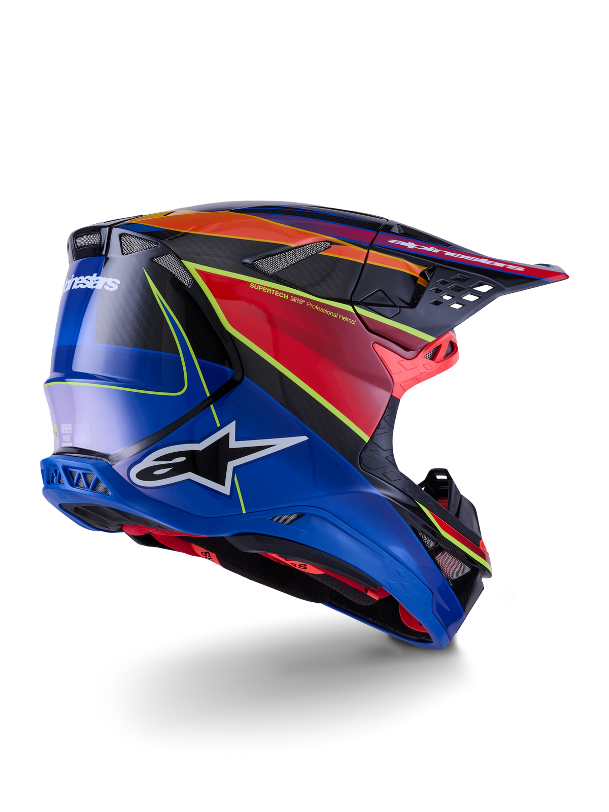 Alpinestars Supertech M10 Era Helm, Motocross-Helm, Blau, Rot und Gelb Fluo Glänzend, Rückseiten-Profilansicht mit Carbonfasergewebe-Details, markantem Alpinestars-Branding, integrierten Belüftungsöffnungen und Hochglanz-Finish für Offroad-Performance.