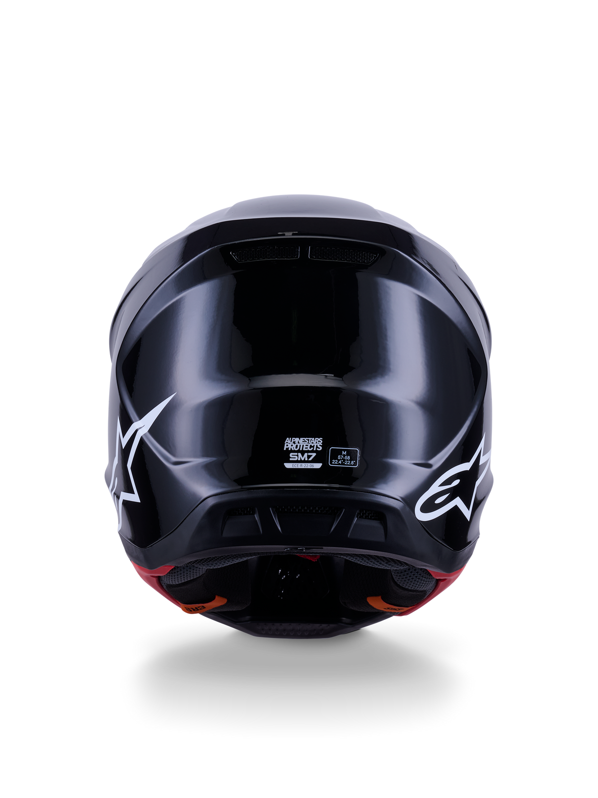 Alpinestars S-M7 Solid Helm ECE 22.06, Motocross-Helm, Glänzend Schwarz, Rückansicht mit weißen Stern-Logos, aerodynamische Verbundschale mit Hochglanz-Finish, Sicherheitszertifizierung und Größenetiketten in der Mitte