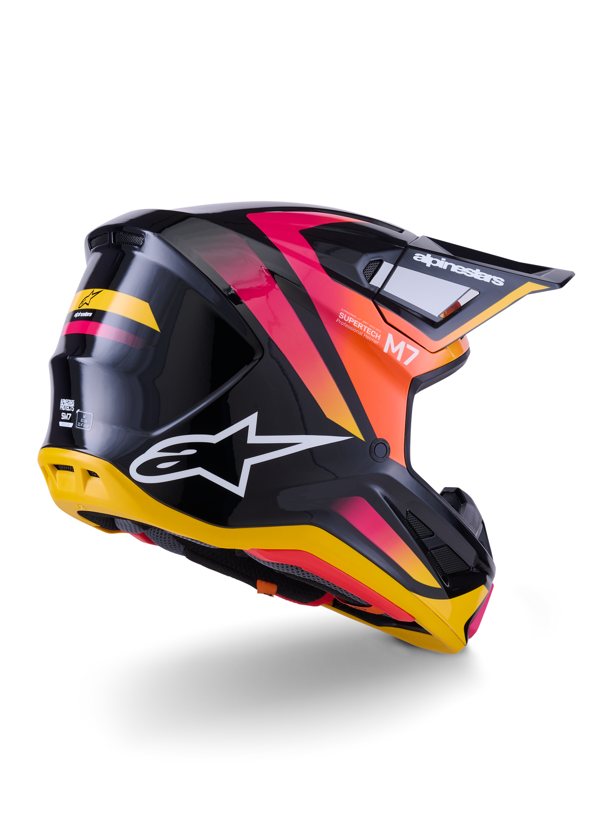 Alpinestars S-M7 Rise Helm, Motocross-Helm, Schwarz, Gelb und Pink glänzend, Rück- und Seitenansicht mit aerodynamischer Verbundschale, lebhaften Farbverläufen, markantem Branding und Belüftungsöffnungen