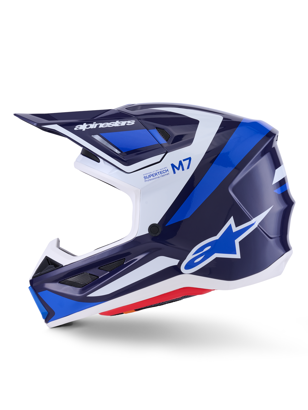 Alpinestars S-M7 Rise Helm, Motocross-Helm, Blau, Weiß und Navy glänzend, Seitenprofil-Ansicht mit Alpinestars-Branding auf dem Visier und an der Seite, M7- und Supertech-Schriftzug, aerodynamische Schale mit Belüftungsöffnungen, glänzendes Finish für Offroad-Performance.