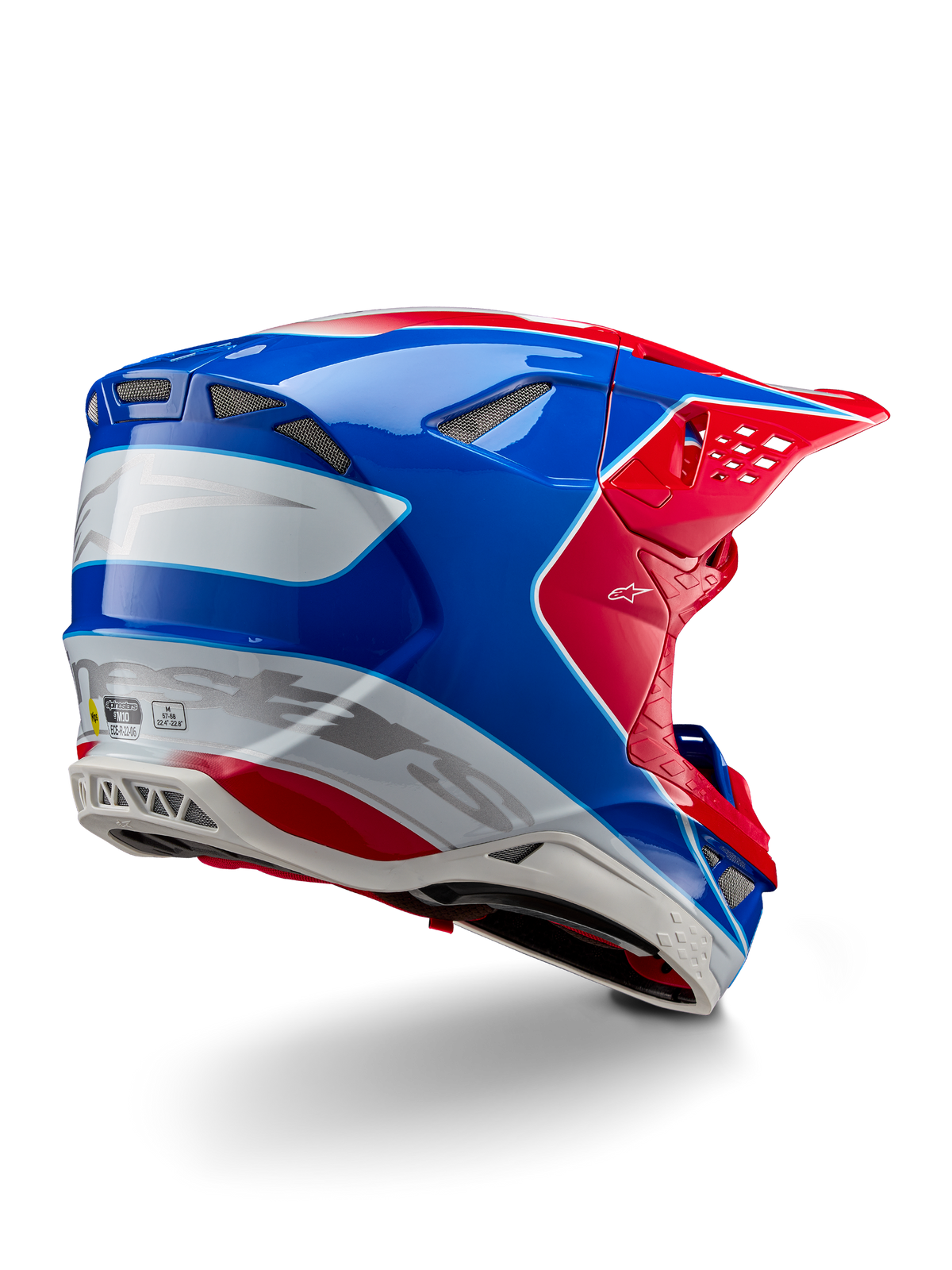 Alpinestars Supertech M10 Aeon ECE 22.06 helm, motorcrosshelm, helderrood, blauw en wit glanzend, achteraanzicht met een aerodynamisch profiel, zilveren Alpinestars-branding en geïntegreerde ventilatieopeningen.