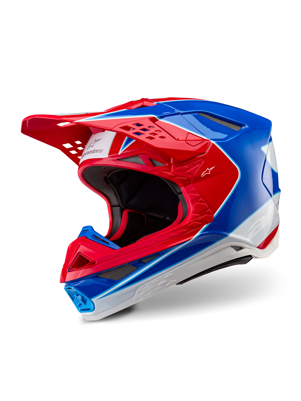 Alpinestars Supertech M10 Aeon helm, motorcrosshelm, glanzend helder rood blauw, driekwart aanzicht met aerodynamische schaal en meerdere ventilatieopeningen, witte en rode grafische accenten, Alpinestars-logo op het vizier en de zijkant, professionele off-road race-uitrusting