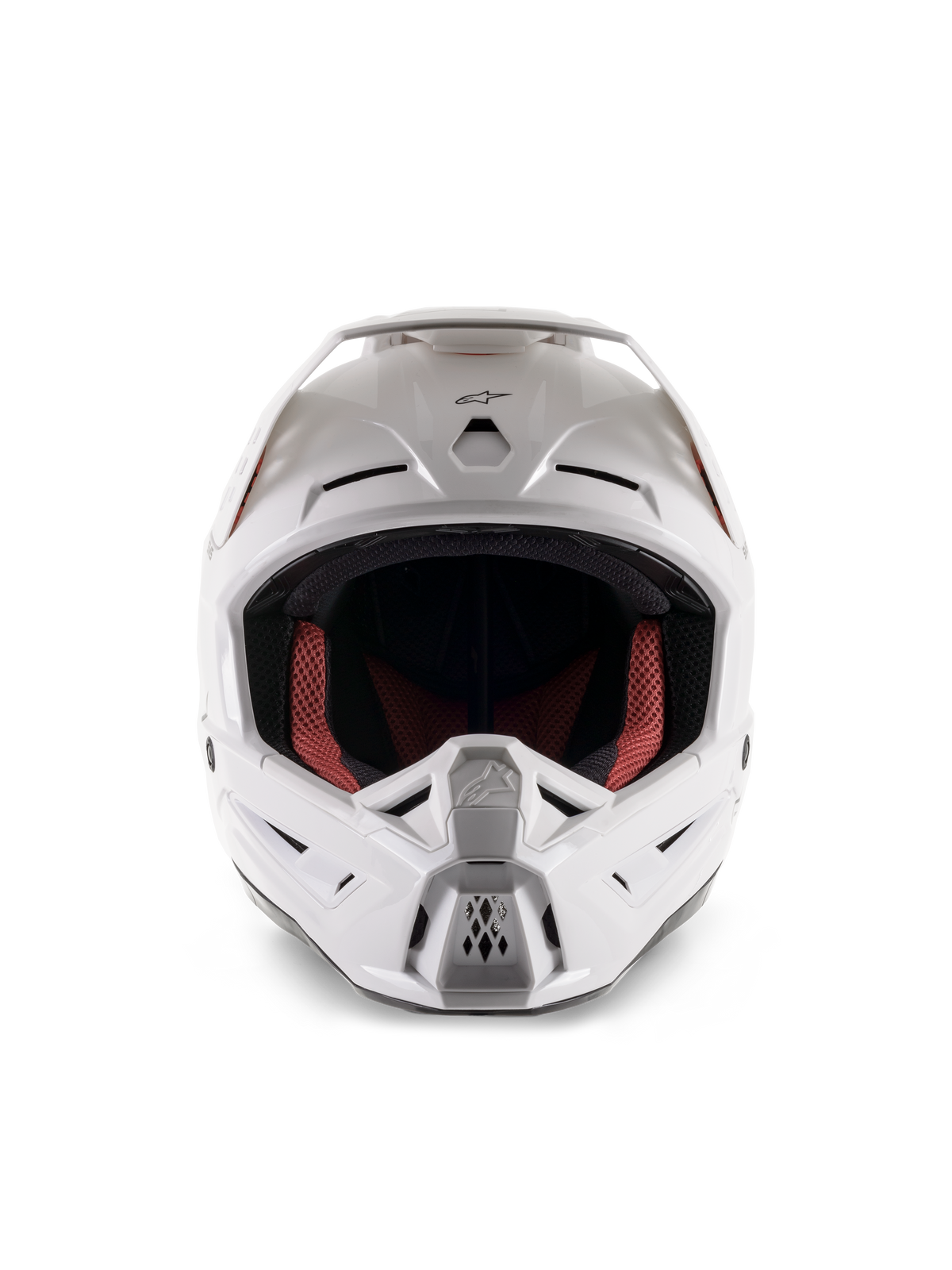 Alpinestars S-M5 Solid helm ECE 22.06, motorcrosshelm, glanzend wit, vooraanzicht, voorzien van meerdere luchtinlaten op de kin en het voorhoofd, breed vizier, rode en zwarte binnenvoering, strak en aerodynamisch ontwerp voor off-road racing
