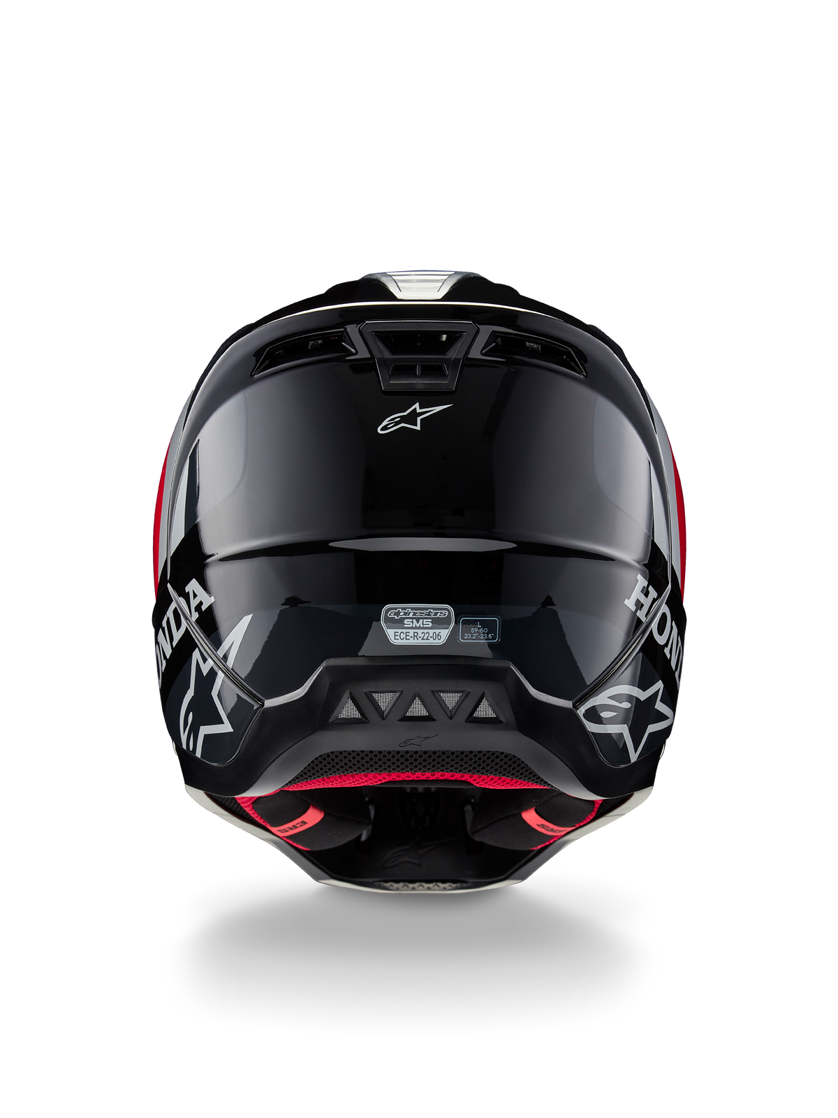 Casque Alpinestars Honda S-M5 ECE, casque de motocross, noir et rouge brillant, vue arrière montrant la coque noire brillante avec les logos Honda et Alpinestars blancs, la doublure intérieure rouge et l'étiquette de certification de sécurité ECE