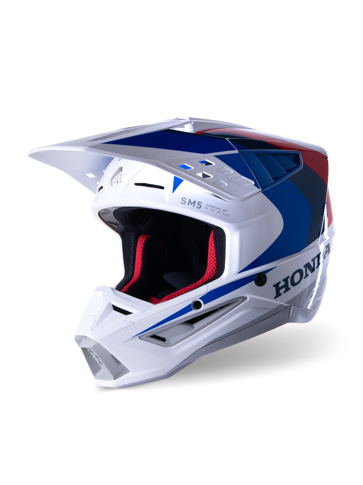 Alpinestars Honda S-M5 Helmet ECE, casque de motocross, blanc, bleu et rouge brillant, avec logo Honda distinctif sur le côté, rembourrage intérieur en mesh rouge, visière aérodynamique avec prises d'air intégrées, design graphique épuré pour le tout-terrain