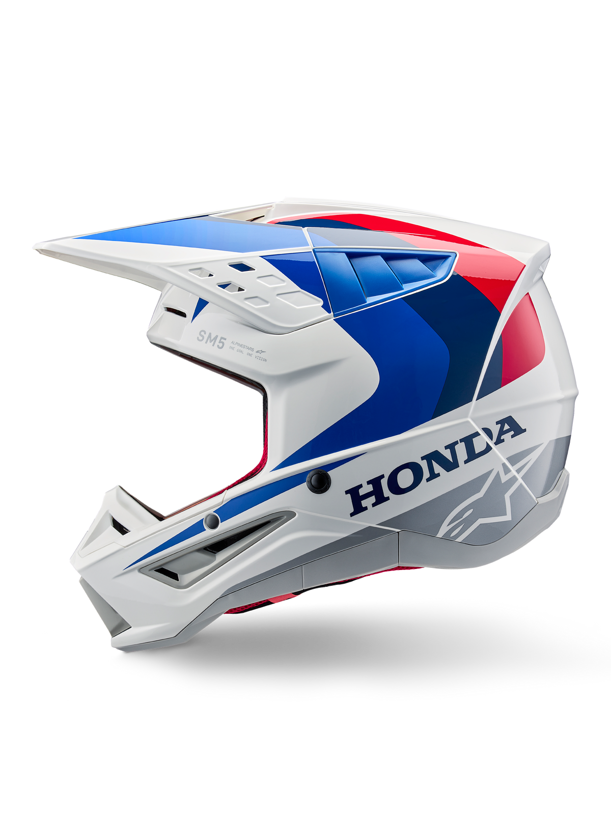 Casque Alpinestars Honda S-M5 ECE, blanc, bleu et rouge brillant, vue de profil, avec marquage Honda audacieux et logo étoile Alpinestars, design aérodynamique de motocross avec de multiples aérations et une visière proéminente, finition brillante