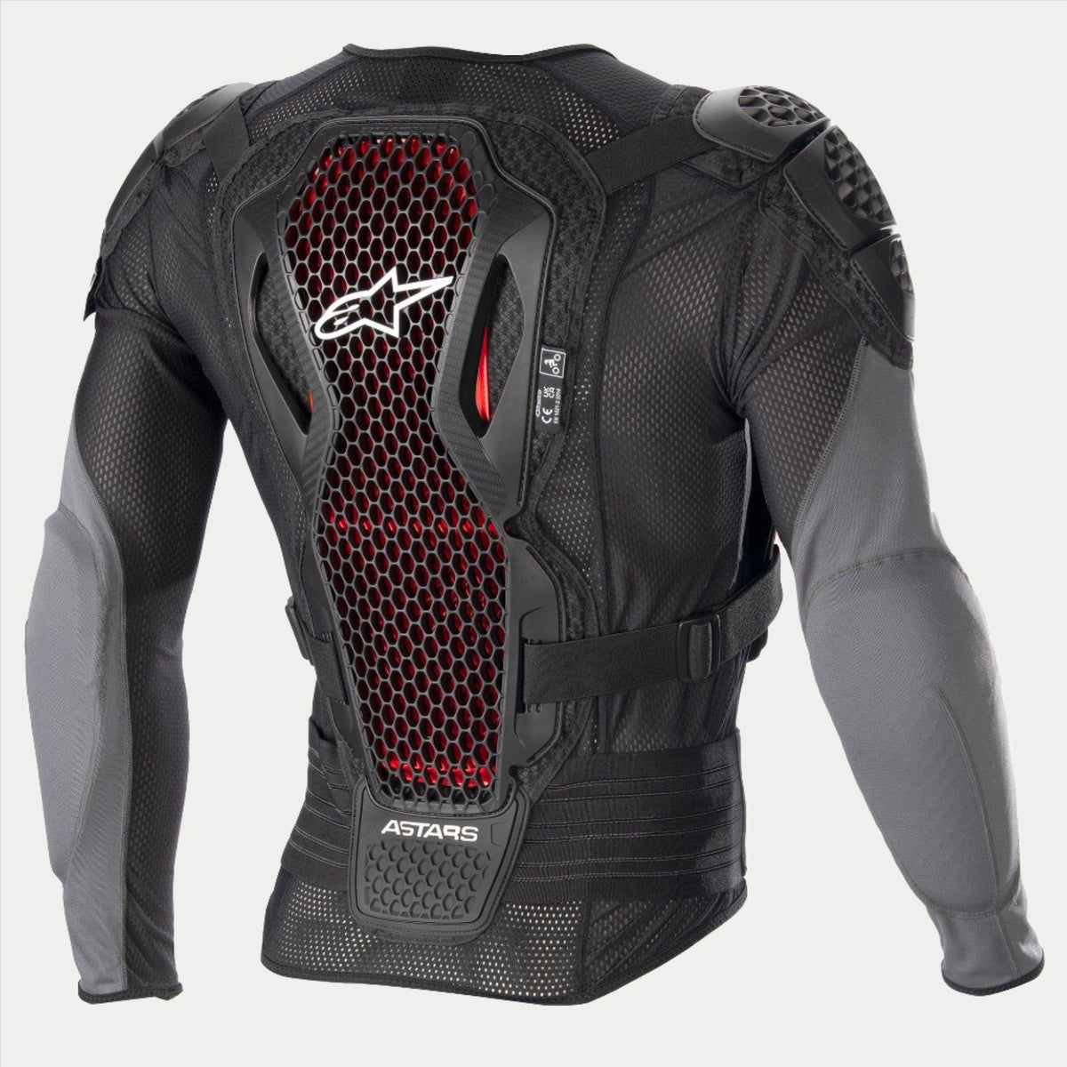 Alpinestars Bionic Plus V2 Schutzjacke, Motocross-Schutzjacke, Schwarz und Anthrazit-Grau mit roten Waben-Details, Rückansicht zeigt den Level 2 Nucleon Cell Technologie Rückenprotektor, perforiertes Mesh-Gewebe und integrierte Schulter- und Ellbogenprotektoren.