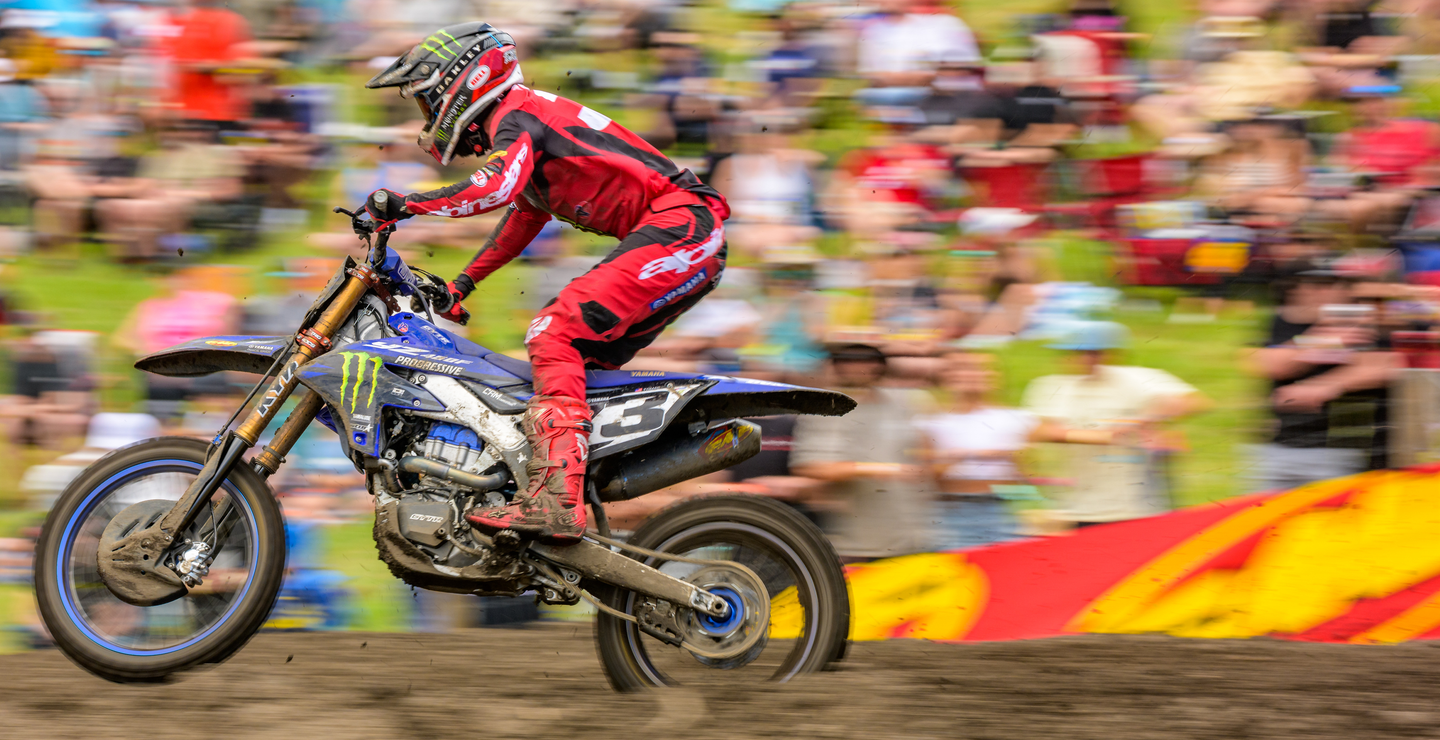Mx rider racing on the track wearing Alpinestars gear