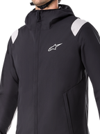 Veste de pluie Alpinestars A-Dura, noire, veste de cyclisme imperméable 2,5 couches avec capuche, fermeture éclair YKK à l'avant et poches doublées de maille, poignets réglables, conçue pour le VTT et une protection par tous les temps