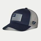Casquette Snapback Flag Alpinestars, bleu marine et gris, visière courbée avec couronne structurée, patch drapeau imprimé à l'avant et logo brodé sur le côté, arrière en maille pour la respirabilité, couvre-chef décontracté inspiré du sport automobile