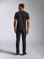 Alpinestars Blaze 2.0 CSF Tee, T-shirt met korte mouwen, zwart, achteraanzicht, gedragen met zwarte jeans, casual motorsport-geïnspireerde streetwear