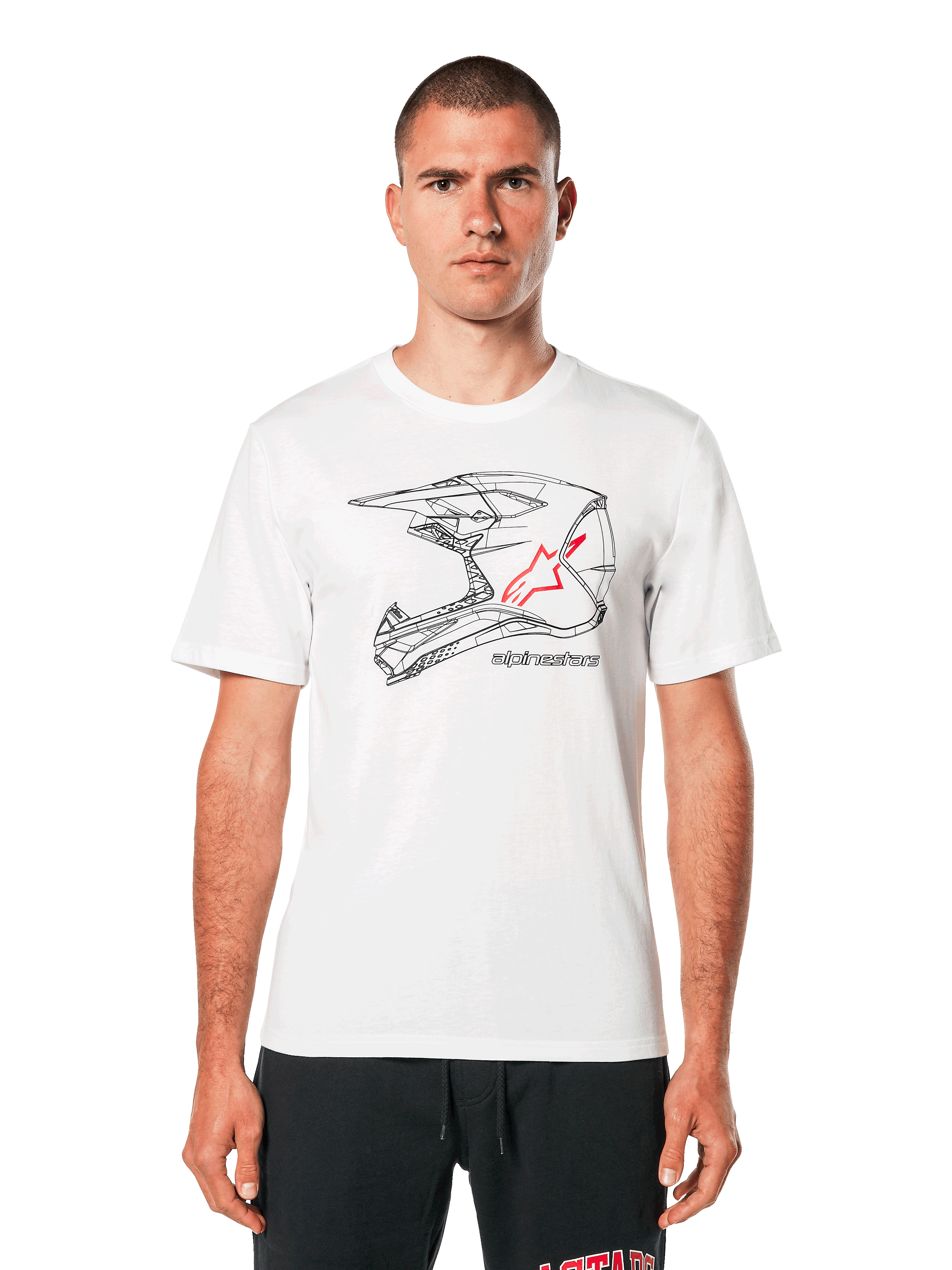 T-shirt Alpinestars MX Helmet CSF, t-shirt blanc à manches courtes, graphique filaire noir de casque de motocross avec logo étoile rouge, streetwear décontracté inspiré du sport automobile, porté par un modèle