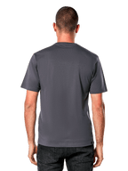 T-shirt Alpinestars Galun CSF, t-shirt à manches courtes, gris anthracite, vue arrière unie, porté avec un jean noir, style streetwear décontracté motorsport