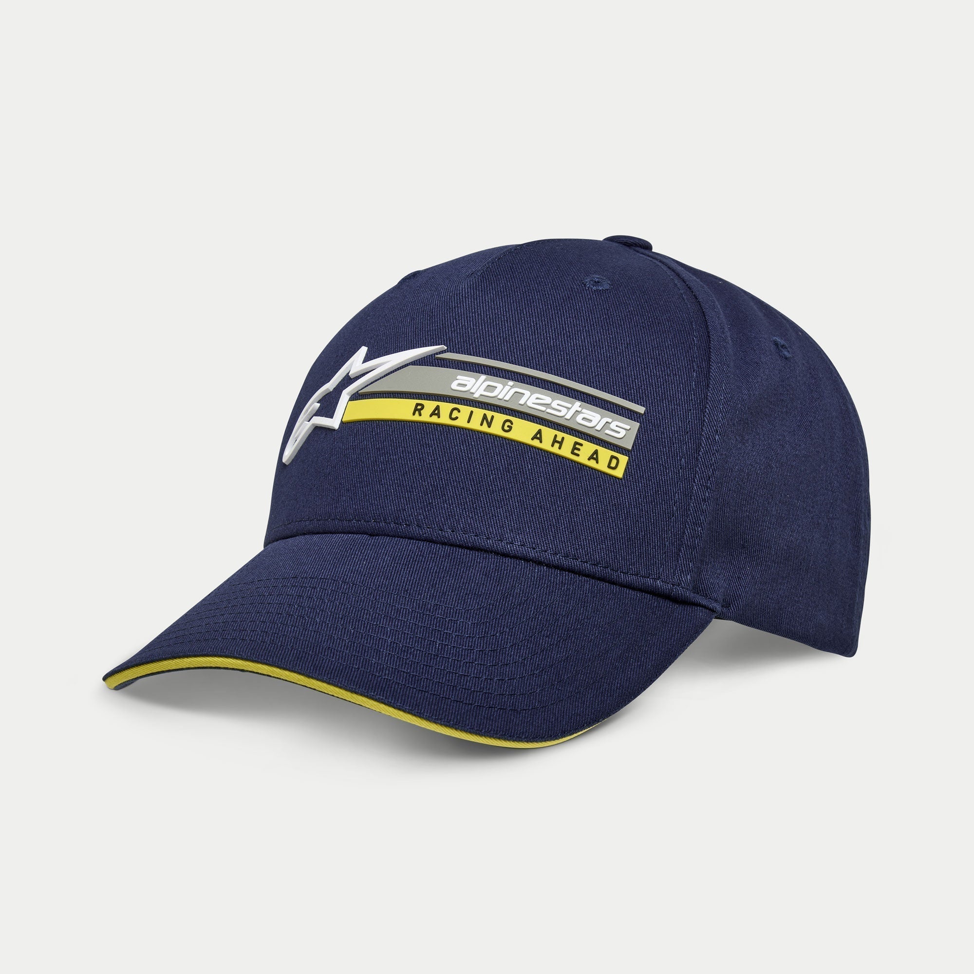 Alpinestars Par Mütze, dunkelblaue Snapback Cap, gebogener Schirm mit gelber Sandwich-Kante, 3D-Logo-Stickerei mit „Racing Ahead“-Grafik, lässige Kopfbedeckung im Motorsport-Stil