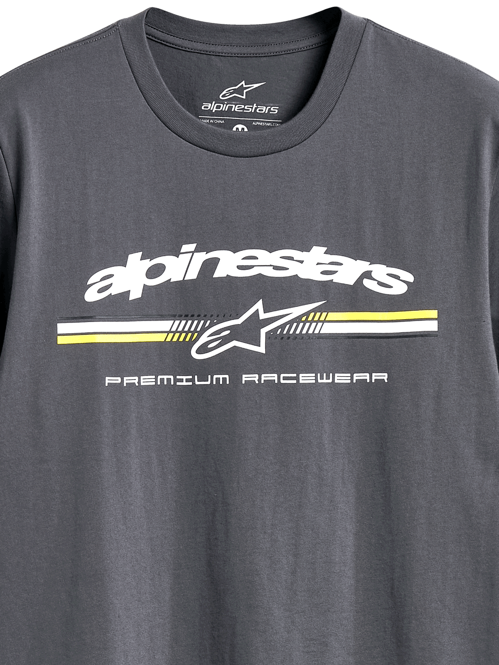 Alpinestars Prevail CSF Tee, T-shirt met korte mouwen, antraciet, wit Alpinestars-logo met gele en witte strepen in paddock-stijl, tekst 'Premium Racewear', casual motorsportkleding
