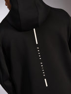 Alpinestars Insight Hoodie, casual sportswear hoodie, zwart, achteraanzicht met verticaal wit Racing Ahead streep-logo, gladde tri-blend double face fleece, modern op motorsport geïnspireerd design