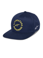 Alpinestars MX Snapback Pet, marineblauw, platte klep met gestructureerde kroon, gele geborduurde Alpinestars Motocross-graphic aan de voorzijde, wit Astars-logo aan de zijkant, katoenen keperstof, casual motorsport headwear