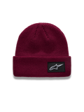 Alpinestars Unload Rib Cuff Bonnet, bonnet en maille jersey tricotée couleur Berry, doté d'un écusson tissé noir et du logo Astars blanc.