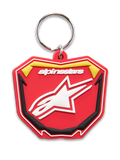 Alpinestars Plate sleutelhanger, 3D gevormde sleutelhanger, rood, geel en zwart, wit Alpinestars-logo en Astars-stersymbool, zilveren metalen ring, op motorsport geïnspireerd MX-plaatontwerp
