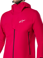 Veste imperméable Alpinestars A-Dura Elite, veste de pluie VTT, rouge fluo, construction technique en ripstop à 3 couches avec capuche par-dessus le casque et rabat tempête frontal, équipement de cyclisme haute performance pour rouler sur les sentiers par tous les temps