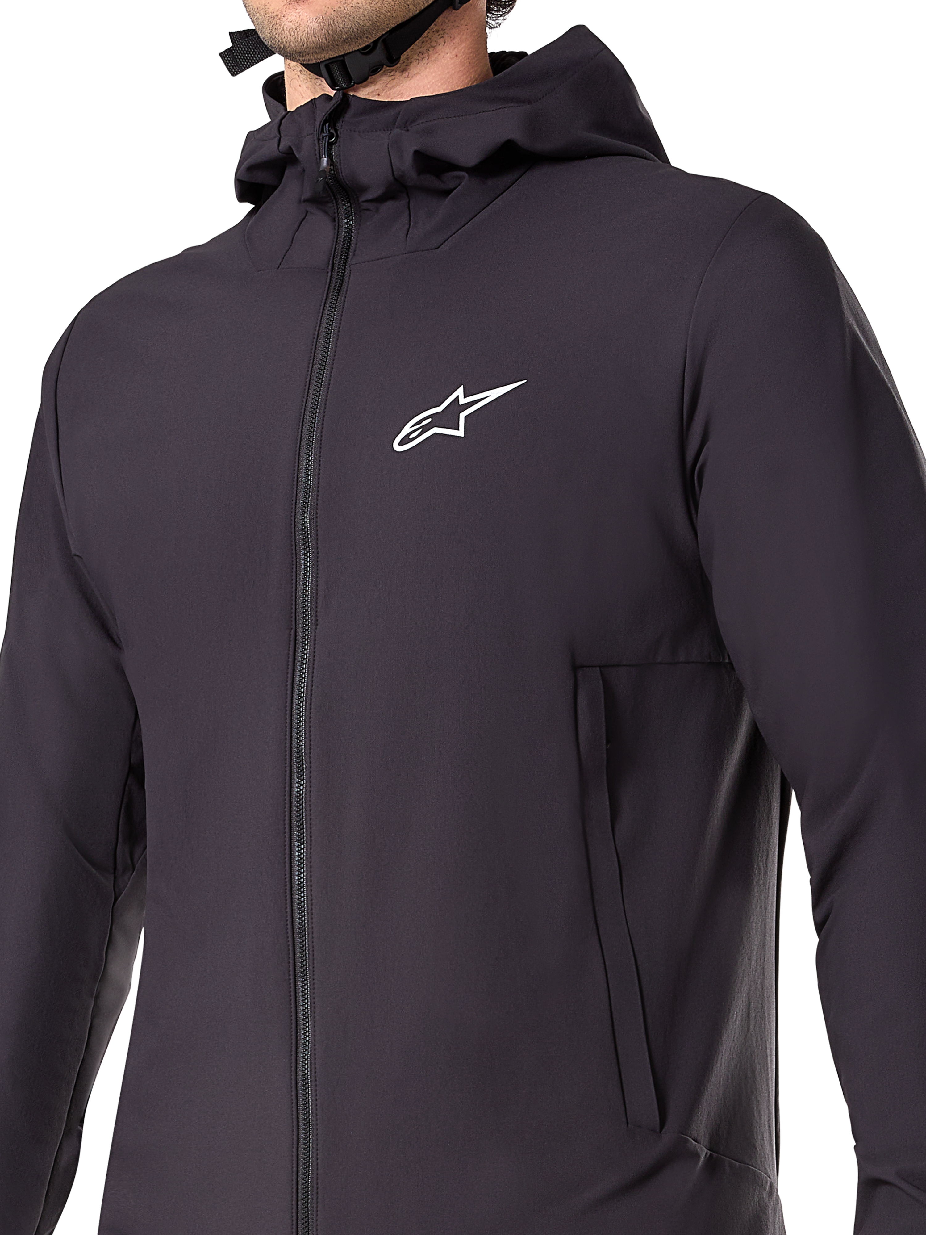 Veste thermique Alpinestars A-Dura, veste de VTT noire, gros plan sur le tissu technique isolant, conception légère et respirante pour le cyclisme tout-terrain par temps froid