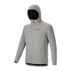 Alpinestars A-Dura Thermal Jacket, lichtgrijze Titanium fietsjas voorzien van een geïsoleerde capuchon, rood logo op de borst en volledige ritssluiting aan de voorzijde, technische mountainbike-uitrusting voor bescherming tegen koud weer.