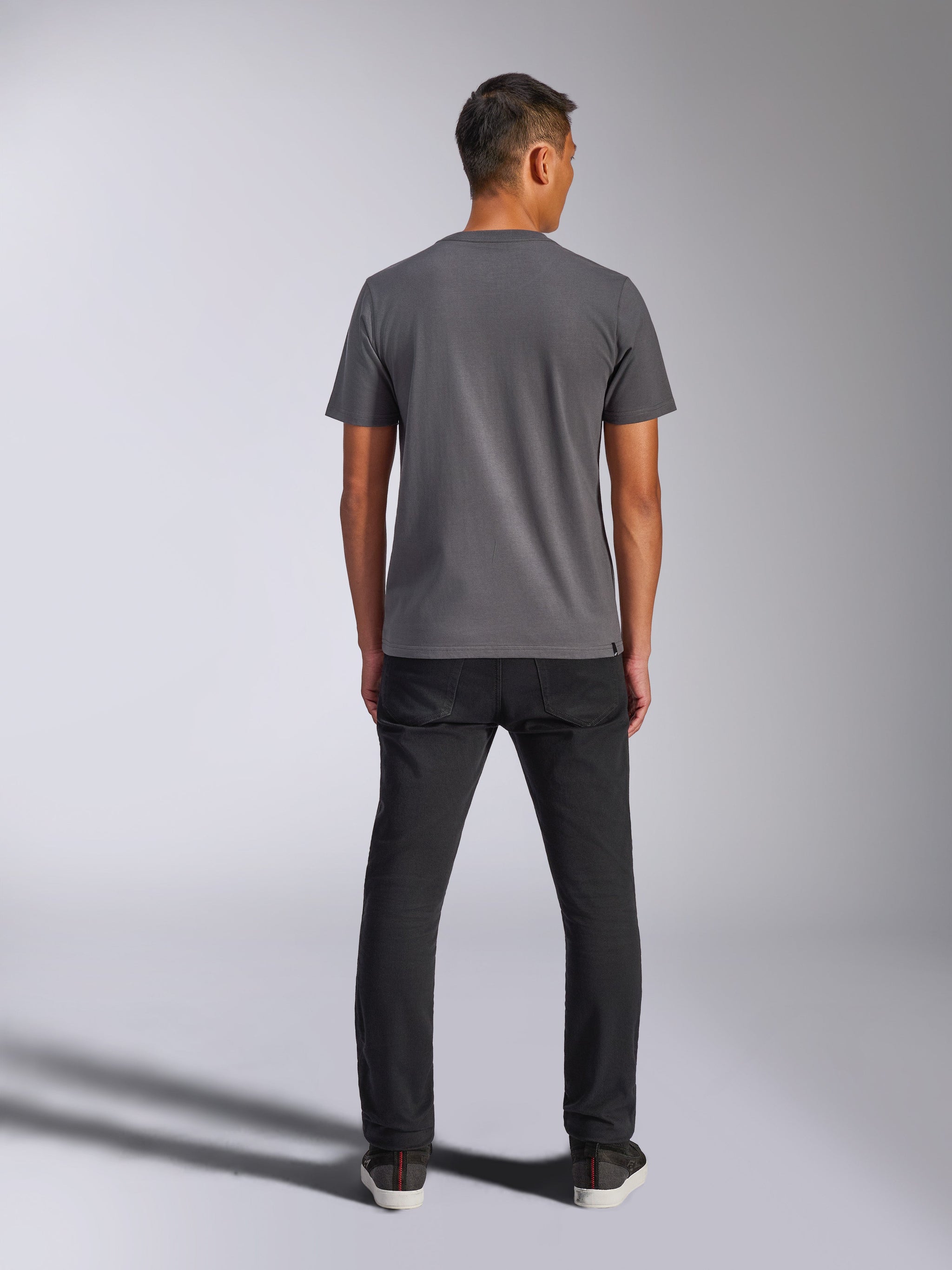 Alpinestars Shaded CSF Tee, Short Sleeve T-Shirt, Charcoal, back view on model, worn with black pants, casual motorsport-inspired streetwear