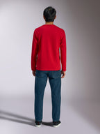 Alpinestars Trackside CSF Tee, T-shirt met lange mouwen, rood, achteraanzicht van model die het shirt draagt met blauwe jeans, casual op motorsport geïnspireerde sportkleding