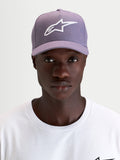 Alpinestars Ageless Snapback Hat, curved bill sportswear cap, dusty purple and white, worn by a model showcasing the front embroidered 3D Astars logo and structured twill profile