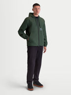 Alpinestars veste coupe-vent Speeder Resolve, veste sportswear légère pour homme, vert pin, dotée d'une capuche et d'un ourlet réglables, avec poches pour les mains et logo Alpinestars sur la poitrine, style urbain
