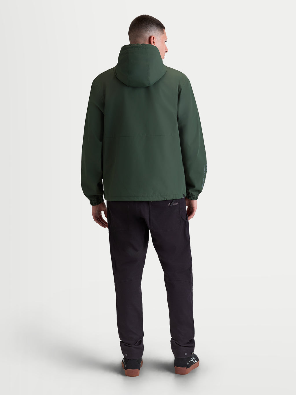 Alpinestars veste coupe-vent Speeder Resolve, veste sportswear légère à capuche pour homme, vert sapin, textile coupe-vent, vue de dos montrant la capuche et les poignets élastiques