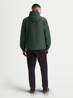 Alpinestars veste coupe-vent Speeder Resolve, veste sportswear légère à capuche pour homme, vert sapin, textile coupe-vent, vue de dos montrant la capuche et les poignets élastiques
