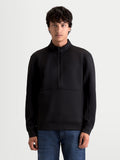 Alpinestars Sweat Half-Zip Apera, sweat à col demi-zippé noir, pull sportswear mixte porté par un modèle, avec poche kangourou et logo HD ton sur ton, style décontracté inspiré du sport automobile