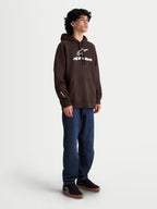 Alpinestars Prelude oversized hoodie, bruine en witte sportswear fleecepullover, ontspannen pasvorm voor heren en dames, voorzien van opvallende puff-print logo's op de borst en mouw, kangoeroezak en hoogwaardige katoenrijke constructie.
