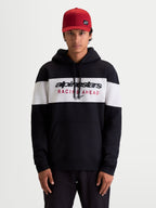 Alpinestars sweat à capuche Cubic, sweat à capuche sportswear pour homme, noir et blanc, design à blocs de couleur avec logo Alpinestars Racing Ahead sur la poitrine, vêtement décontracté avec capuche à cordon et poche kangourou.