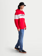 Alpinestars Sweat à capuche Cubic, sweat sportswear pour homme, rouge et blanc, vue de profil sur modèle avec design color-block, logo Alpinestars sur la poitrine, poche kangourou et capuche à cordon pour un style décontracté.